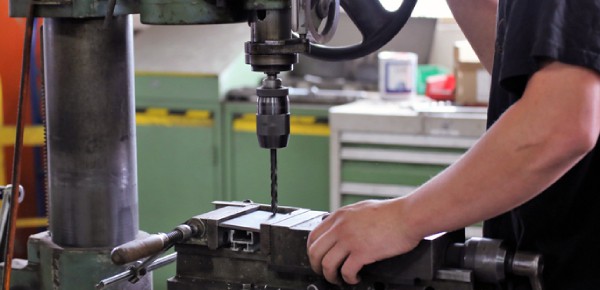 man using cnc machine