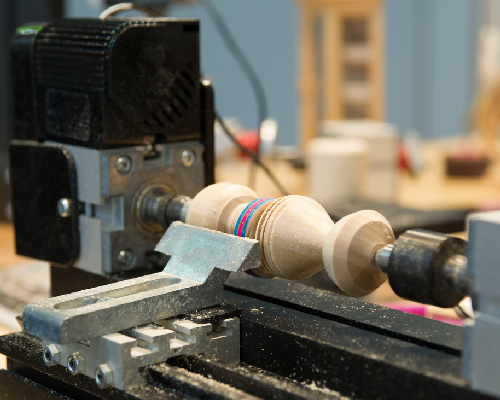 a lathe machine turning wood